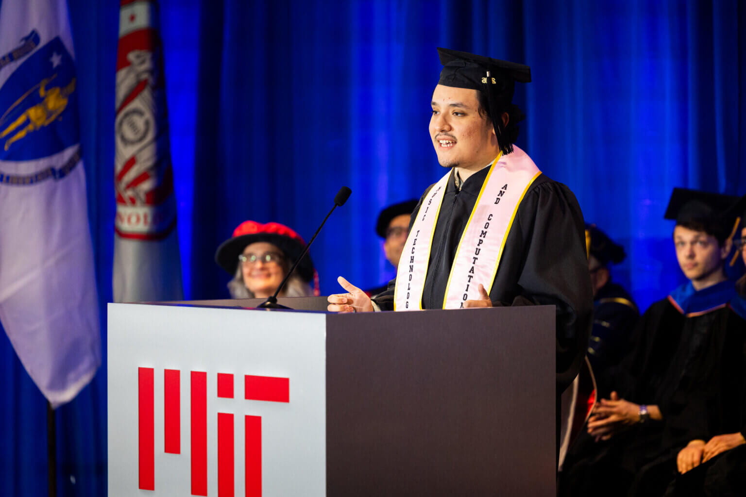 Student addressing audience at MIT Commencement.