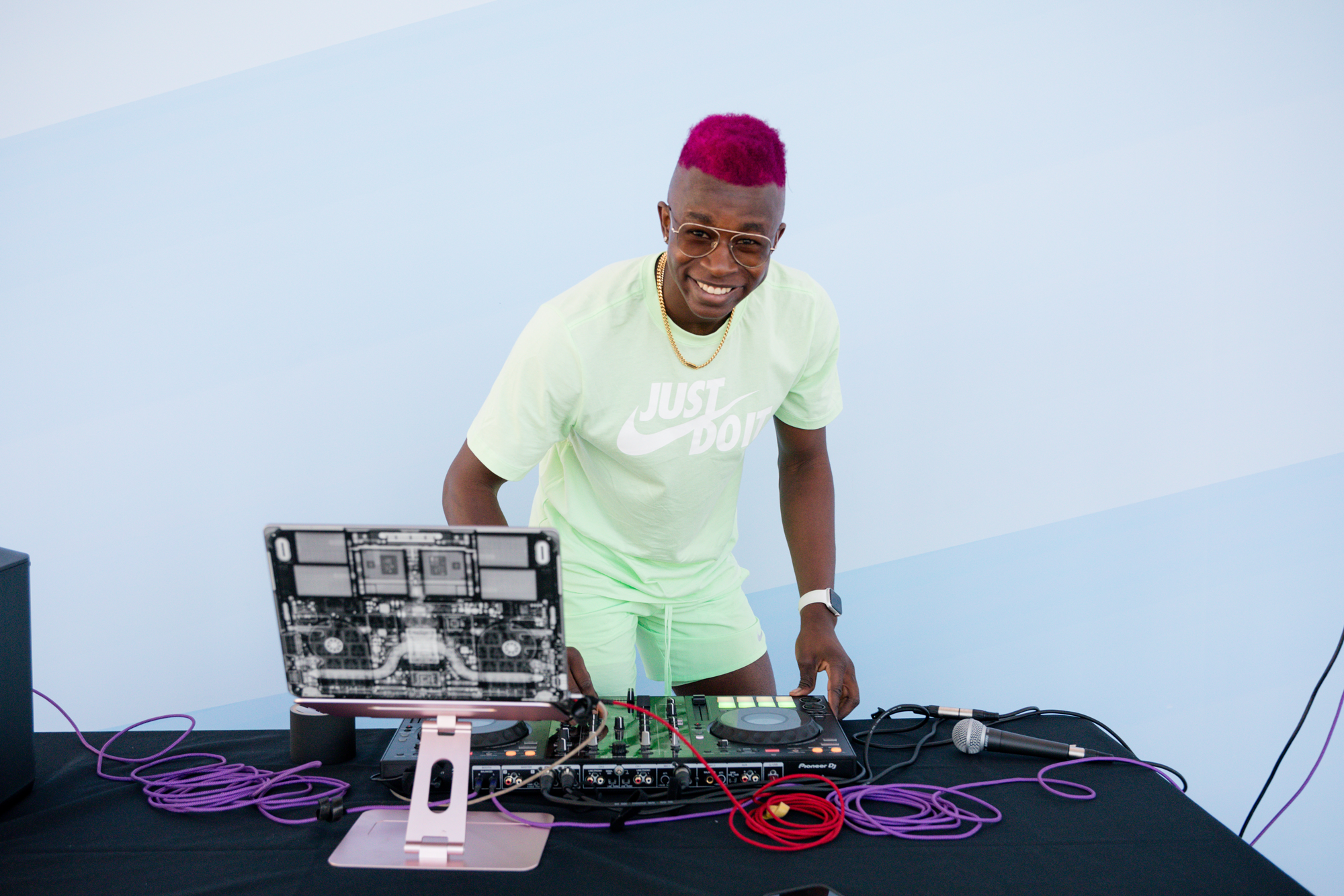 Person operating sound equipment.