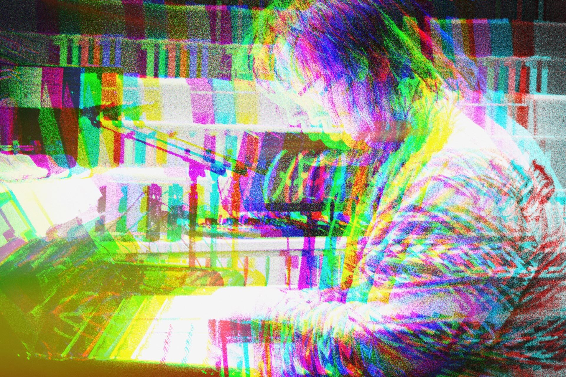 Student at a keyboard.
