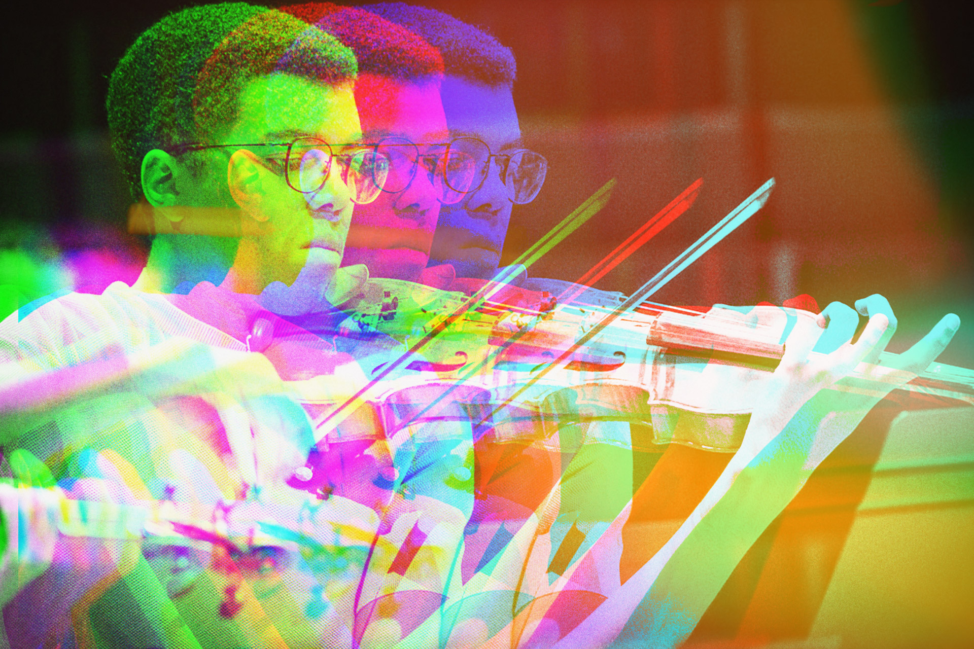 Student playing an instrument.