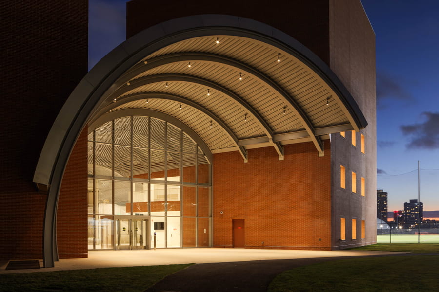 `Edward and Joyce Linde Music Building at night.